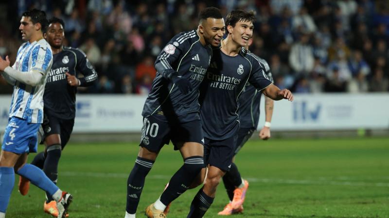 广东男篮防守稳固力克上海（广东男篮以稳固防守击退上海）